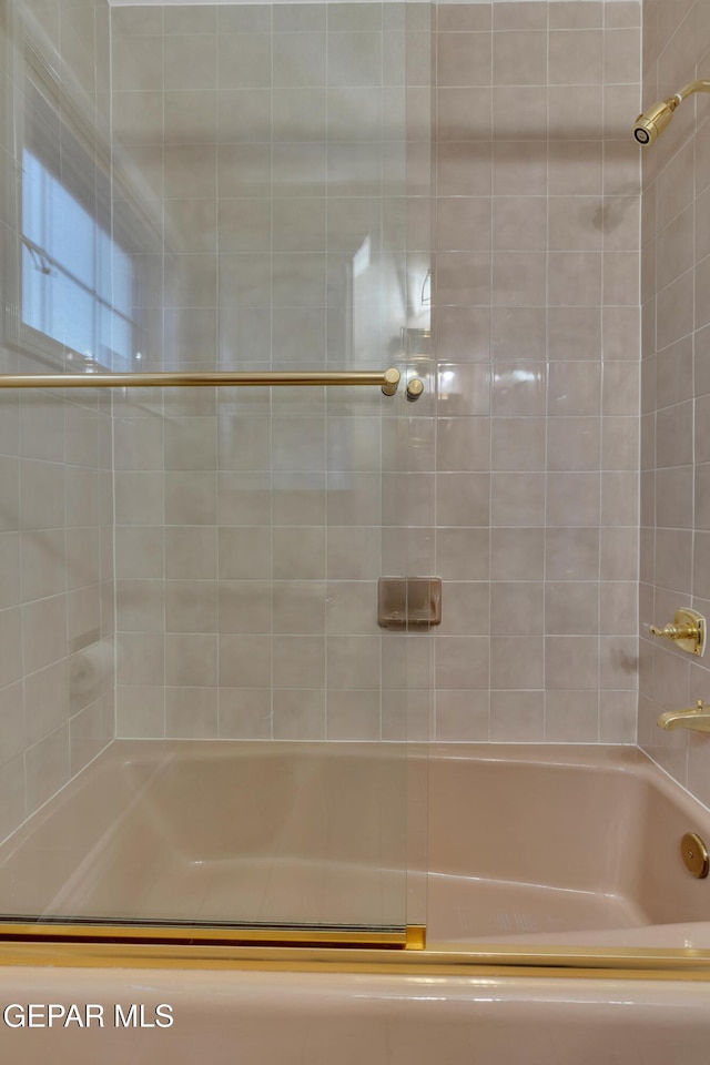 bathroom with shower / bathtub combination