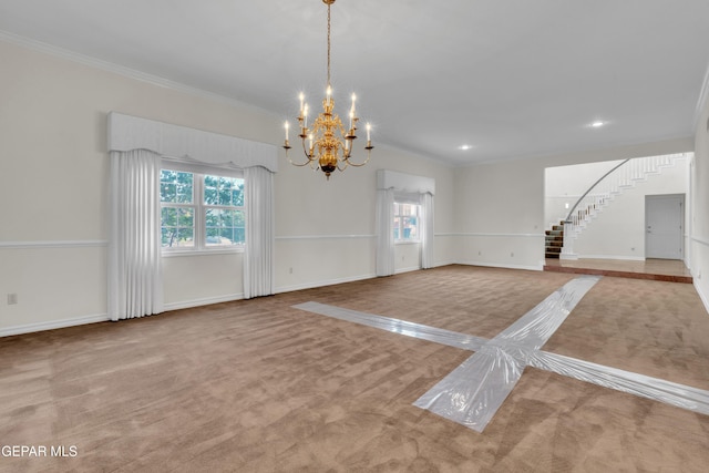 unfurnished dining area featuring stairs, a chandelier, plenty of natural light, and ornamental molding