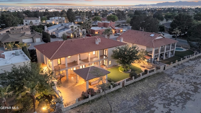 birds eye view of property with a residential view
