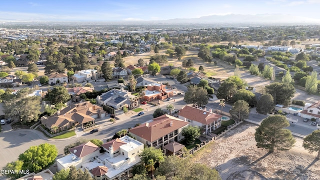 bird's eye view featuring a mountain view and a residential view