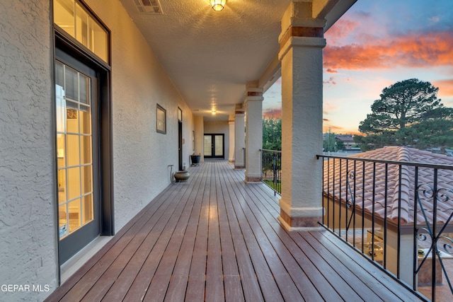 deck at dusk with visible vents