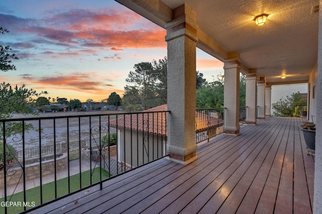 view of deck at dusk