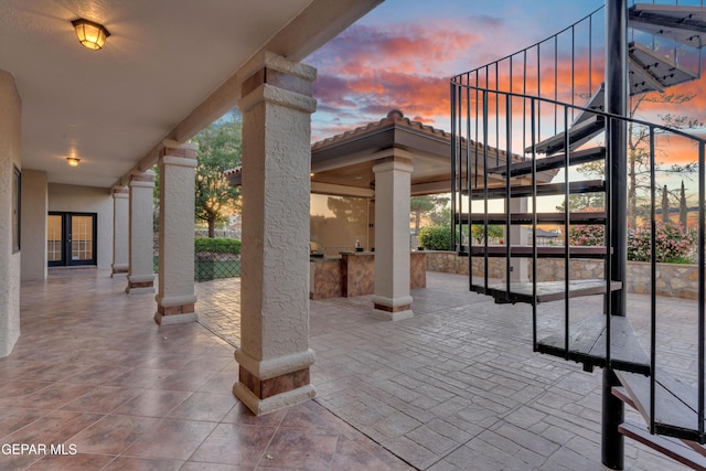 view of patio / terrace with stairway and outdoor dry bar