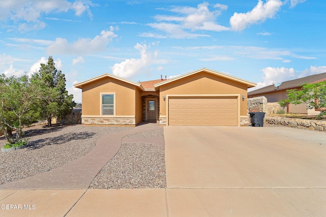 ranch-style house with stone siding, an attached garage, driveway, and stucco siding