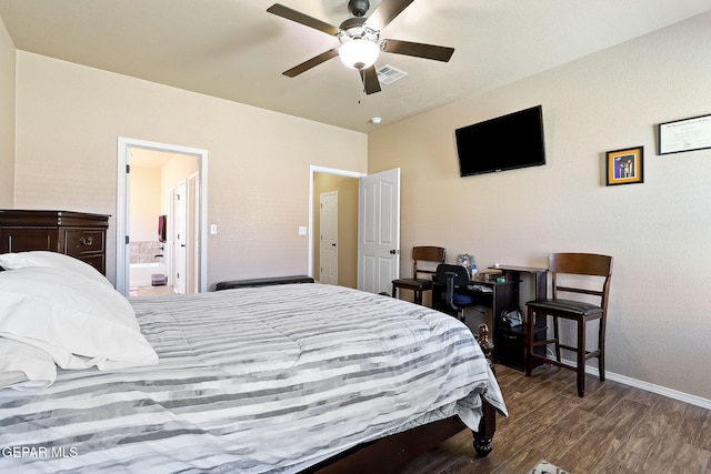 bedroom with visible vents, baseboards, wood finished floors, ceiling fan, and connected bathroom