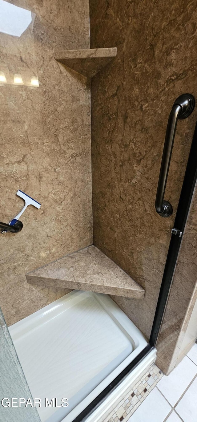 2704 Gaston Dr, El Paso, TX 79935 - full bathroom featuring a shower and tile patterned floors