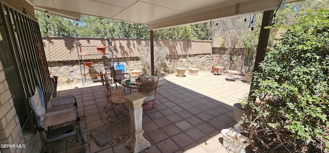 2704 Gaston Dr, El Paso, TX 79935 - view of patio / terrace featuring fence
