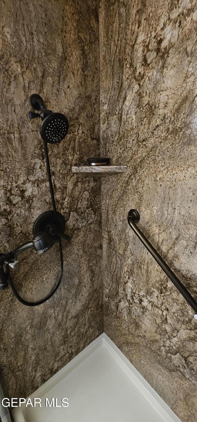 2704 Gaston Dr, El Paso, TX 79935 - room details featuring tiled shower