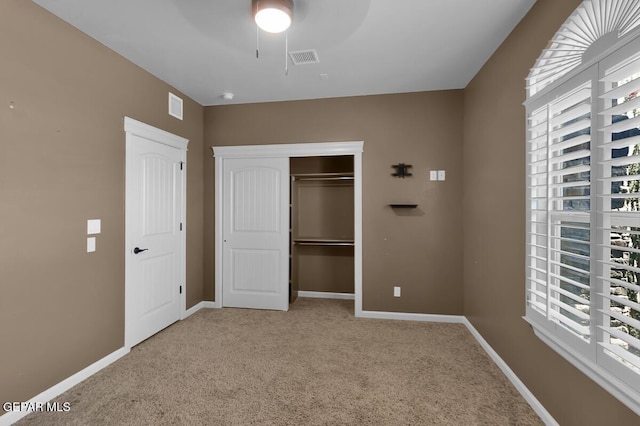 7229 Camino Del Sol Dr, El Paso, TX 79911 - unfurnished bedroom featuring baseboards, carpet flooring, a closet, and a ceiling fan