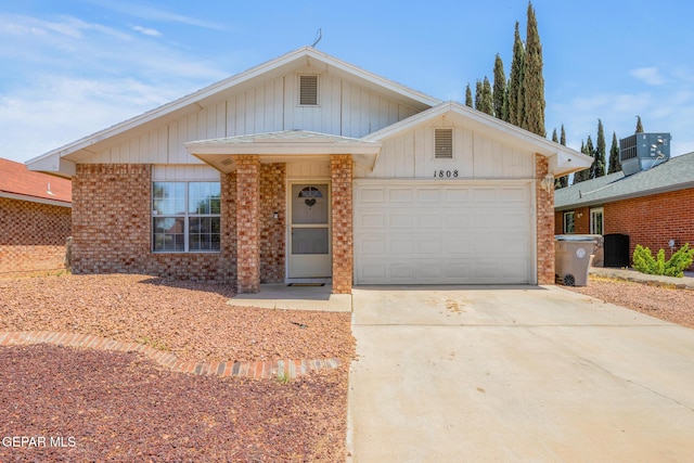 1808 Loanda Ln, El Paso, TX 79928 - single story home with a garage, central AC unit, brick siding, and concrete driveway