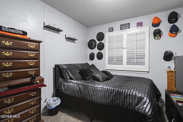 1808 Loanda Ln, El Paso, TX 79928 - carpeted bedroom with a textured ceiling
