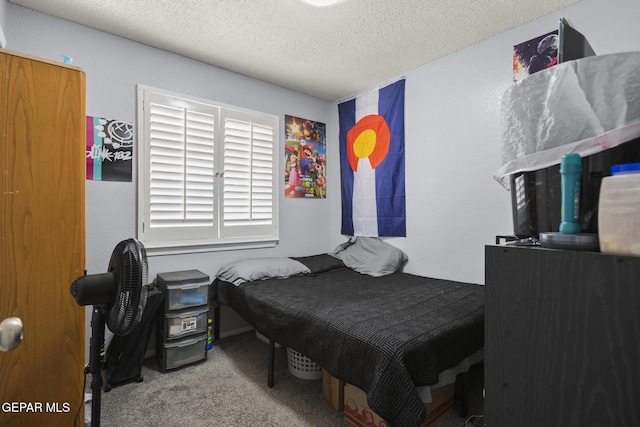 1808 Loanda Ln, El Paso, TX 79928 - bedroom with a textured ceiling and carpet flooring
