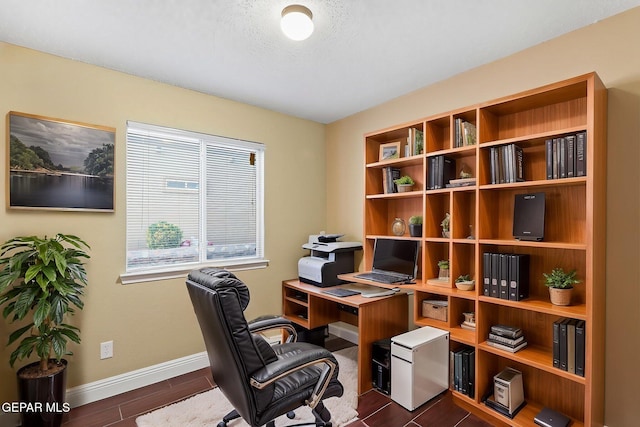 office space with baseboards and dark wood-type flooring