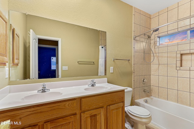 full bathroom with a sink, shower / bathtub combination with curtain, toilet, and double vanity
