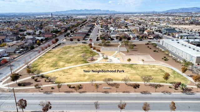 bird's eye view featuring a residential view and a mountain view