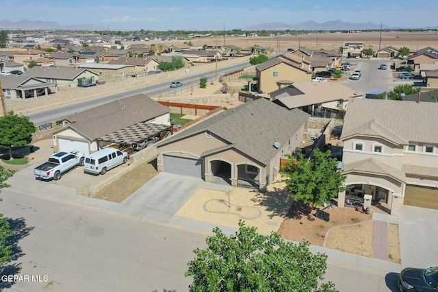 aerial view with a residential view and a mountain view