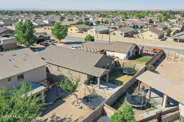 birds eye view of property with a residential view