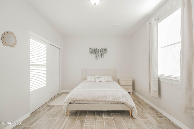 10716 Drew Pearson Dr, El Paso, TX 79924 - bedroom featuring baseboards and wood finish floors