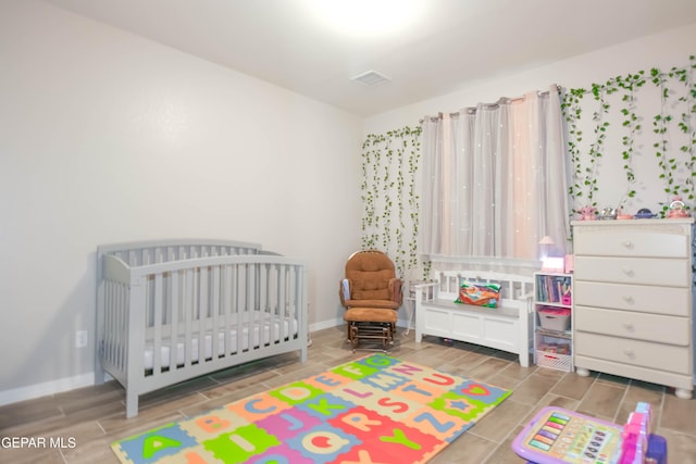 10716 Drew Pearson Dr, El Paso, TX 79924 - bedroom with baseboards and visible vents