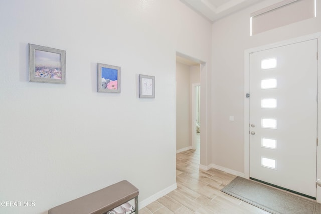 10716 Drew Pearson Dr, El Paso, TX 79924 - entryway featuring baseboards and wood finish floors