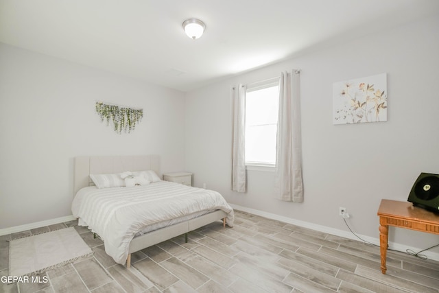 10716 Drew Pearson Dr, El Paso, TX 79924 - bedroom with wood finish floors and baseboards