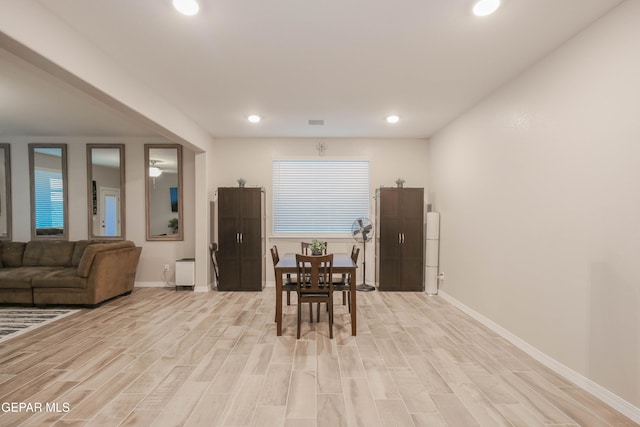 10716 Drew Pearson Dr, El Paso, TX 79924 - dining area featuring recessed lighting, light wood-style floors, plenty of natural light, and baseboards