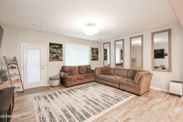 10716 Drew Pearson Dr, El Paso, TX 79924 - living area featuring light wood-style flooring and baseboards