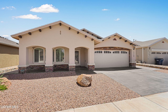 mediterranean / spanish house with a garage, stucco siding, covered porch, and concrete driveway