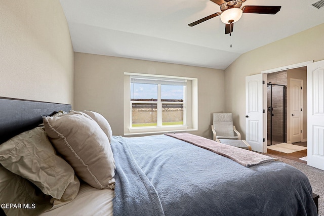 bedroom with visible vents, carpet, ceiling fan, and vaulted ceiling