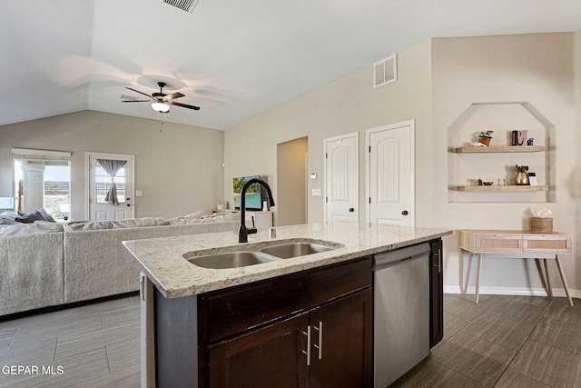 kitchen featuring ceiling fan, visible vents, stainless steel dishwasher, a sink, and open floor plan