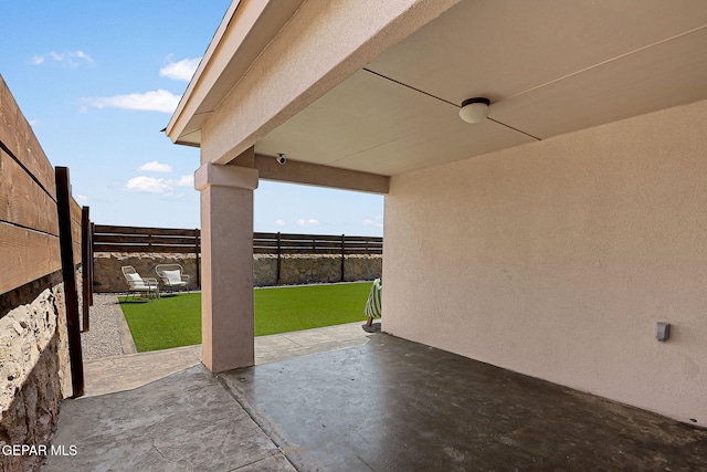 view of patio with a fenced backyard