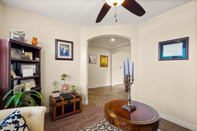hall with arched walkways, carpet flooring, baseboards, and recessed lighting