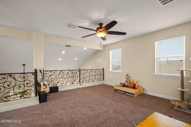 rec room featuring carpet, a healthy amount of sunlight, and a ceiling fan