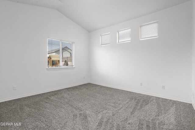 14218 Charles Pollock Ave, El Paso, TX 79938 - carpeted spare room with vaulted ceiling and baseboards