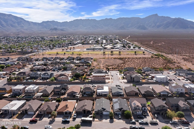 aerial perspective of suburban area with mountains