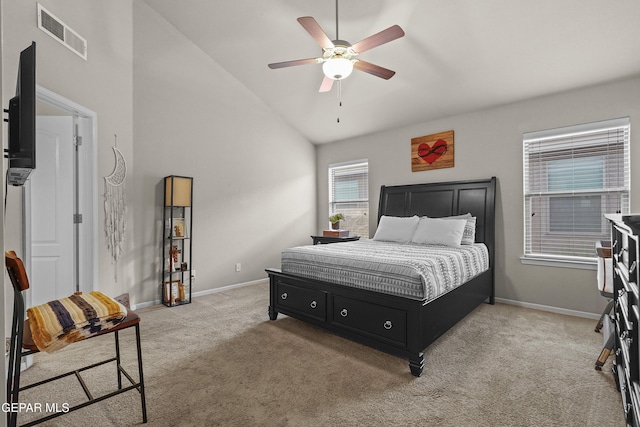 bedroom featuring light carpet, baseboards, high vaulted ceiling, and ceiling fan
