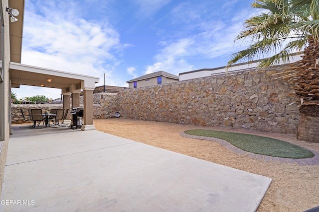 view of patio / terrace featuring a fenced backyard and outdoor dining area