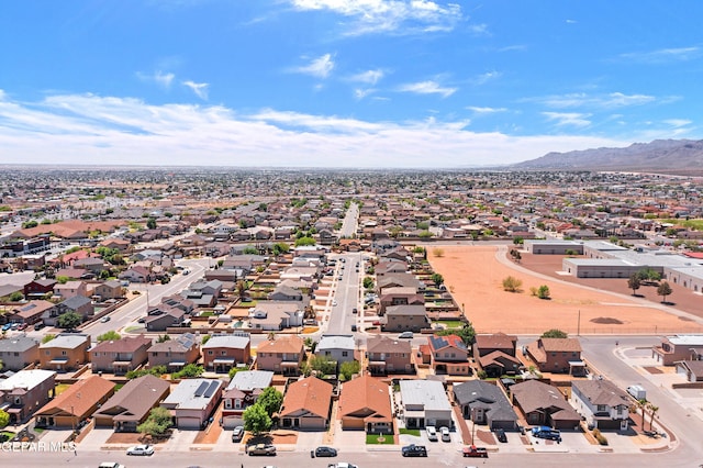birds eye view of property featuring a residential view and a mountain view