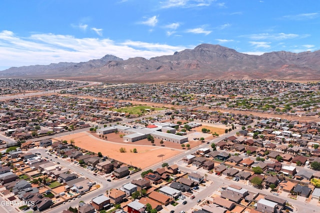 birds eye view of property featuring a residential view and a mountain view