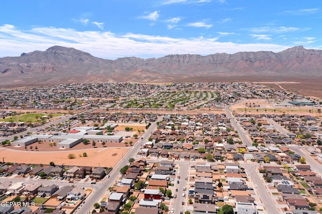 birds eye view of property featuring a residential view and a mountain view
