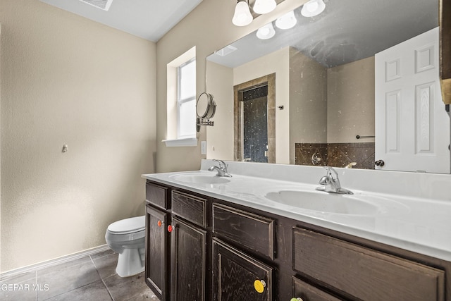 full bath with tile patterned flooring, a sink, double vanity, and toilet