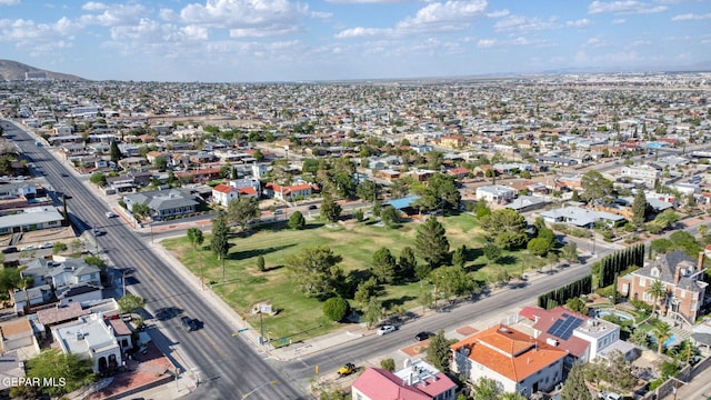 drone / aerial view featuring a residential view and a mountain view