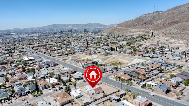 birds eye view of property with a residential view and a mountain view