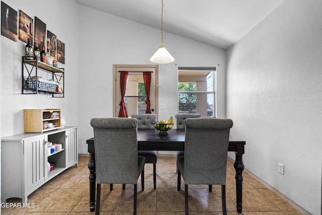 11400 Pifas Nevarez Pl, El Paso, TX 79934 - dining room featuring light tile patterned flooring and vaulted ceiling