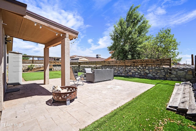 11400 Pifas Nevarez Pl, El Paso, TX 79934 - view of patio featuring a fenced backyard and an outdoor fire pit