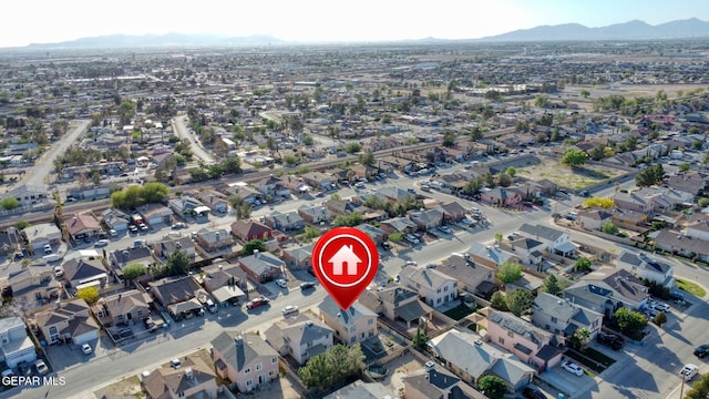 aerial view with a mountain view and a residential view