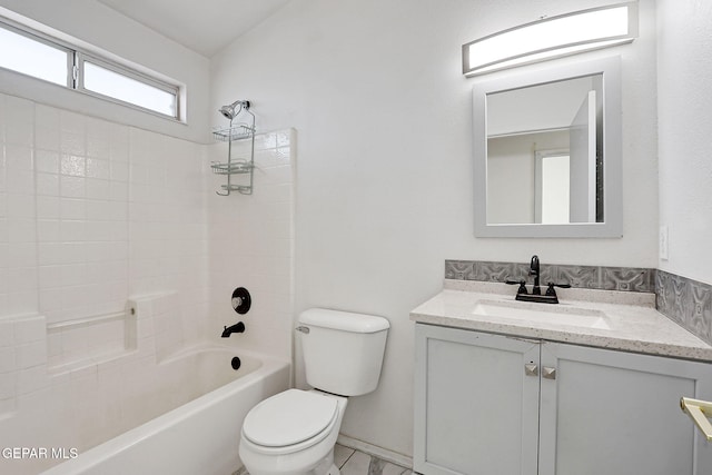 bathroom with toilet, shower / bathtub combination, and vanity