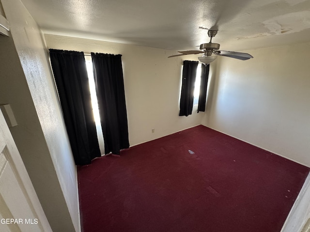 5013 Vulcan Ave, El Paso, TX 79904 - unfurnished room featuring carpet flooring and ceiling fan