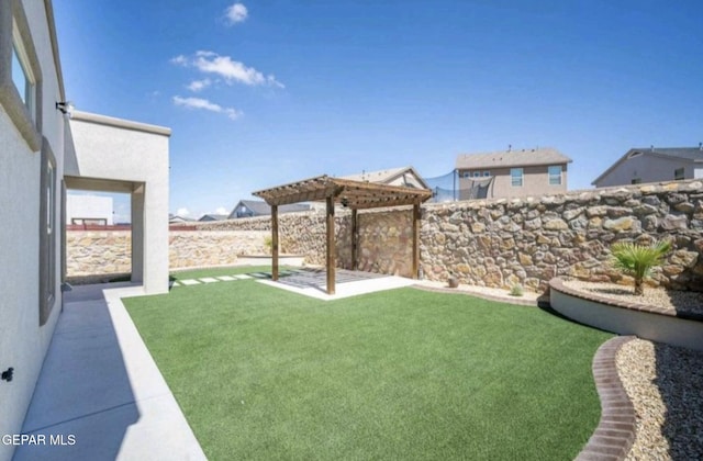 view of yard with a pergola, a patio area, and fence private yard
