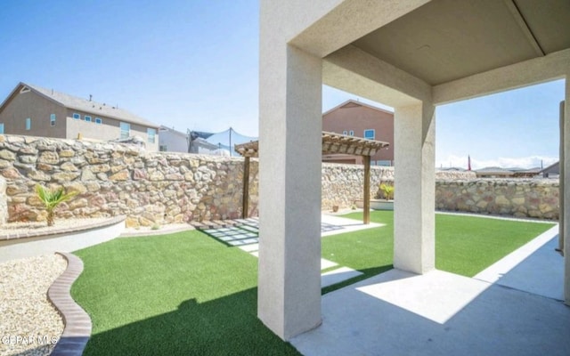 view of yard with a pergola, a patio, and a fenced backyard